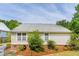 Rear view of house with landscaping and brick at 1135 Harborgate Dr, Mount Pleasant, SC 29464