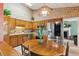 Kitchen features oak cabinets, stainless steel appliances, and an adjoining dining area at 1135 Harborgate Dr, Mount Pleasant, SC 29464