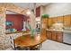 Eat-in kitchen with oak cabinets, stainless steel appliances, and view to living room at 1135 Harborgate Dr, Mount Pleasant, SC 29464