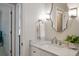 Elegant bathroom featuring a quartz vanity and ornate mirror at 1135 Harborgate Dr, Mount Pleasant, SC 29464