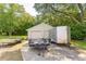 Two-car garage with trailers parked in front at 1135 Harborgate Dr, Mount Pleasant, SC 29464