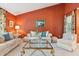 Spacious living room with terracotta walls and comfy seating at 1135 Harborgate Dr, Mount Pleasant, SC 29464