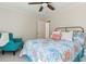 Bedroom with a queen bed, teal armchair and ceiling fan at 1135 Harborgate Dr, Mount Pleasant, SC 29464
