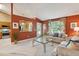 Open living area with terracotta walls and kitchen peek at 1135 Harborgate Dr, Mount Pleasant, SC 29464