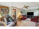 Cozy living room featuring a fireplace, built-in shelving, and a neutral color scheme at 1135 Harborgate Dr, Mount Pleasant, SC 29464