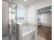Modern bathroom features a walk-in shower and a view into a bedroom at 139 Dantzler Rd, Harleyville, SC 29448