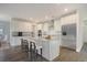 Modern kitchen with white cabinets, granite countertops, and stainless steel appliances at 135 Dantzler Rd, Harleyville, SC 29448