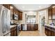 Modern kitchen with stainless steel appliances and granite countertops at 157 Collared Dove Ct, Summerville, SC 29483
