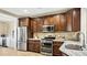 Spacious kitchen with stainless steel appliances and light brown cabinets at 157 Collared Dove Ct, Summerville, SC 29483