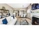 Bright living room with a fireplace and open floor plan at 157 Collared Dove Ct, Summerville, SC 29483