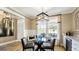 Bright dining area with glass table and seating for four at 157 Collared Dove Ct, Summerville, SC 29483