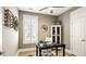Bright home office with a desk, chair, and built-in shelving at 157 Collared Dove Ct, Summerville, SC 29483
