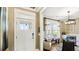 Welcoming entryway with white door and view into the dining area at 157 Collared Dove Ct, Summerville, SC 29483