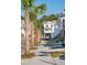 Houses with palm trees along a sidewalk in a coastal community at 1659 Cultivation Ln # 454, Mount Pleasant, SC 29466