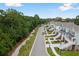 Aerial view of a charming community with tree-lined streets and houses at 1659 Cultivation Ln # 454, Mount Pleasant, SC 29466