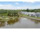 Aerial view of community with pond and lush trees at 1653 Siloh Dr # 490, Mount Pleasant, SC 29466