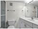 Clean bathroom with white vanity and a large mirror at 330 Concord St # 5 A, Charleston, SC 29401