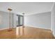 Bright living room with hardwood floors and balcony access at 330 Concord St # 5 A, Charleston, SC 29401
