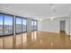 Living room with hardwood floors, large windows and water view at 330 Concord St # 5 A, Charleston, SC 29401