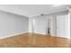 Large bedroom with hardwood floors and access to bathroom at 330 Concord St # 5 A, Charleston, SC 29401