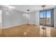 Bright living room with hardwood floors and balcony access at 330 Concord St # 5 A, Charleston, SC 29401