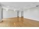 Hardwood floors and neutral walls in this spacious living room at 330 Concord St # 5 A, Charleston, SC 29401