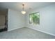 Bright dining area with carpet and light fixture at 202 Greencastle Dr, Goose Creek, SC 29445