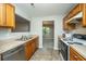 Kitchen with wood cabinets and stainless steel appliances at 202 Greencastle Dr, Goose Creek, SC 29445