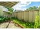 Private patio area with wooden fence and greenery at 202 Greencastle Dr, Goose Creek, SC 29445