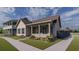 Charming craftsman style home with front porch and landscaped yard at 452 Ripple Park Dr, Summerville, SC 29486
