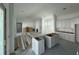 Open kitchen with gray cabinets and island, still under construction at 452 Ripple Park Dr, Summerville, SC 29486