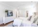 Spacious bedroom with white bedding and large windows at 383 Wappoo Trace Ln, Summerville, SC 29486