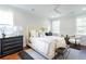 Bright bedroom with a king-size bed and plenty of natural light at 383 Wappoo Trace Ln, Summerville, SC 29486