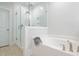 Spa-like bathroom featuring a soaking tub and walk-in shower at 383 Wappoo Trace Ln, Summerville, SC 29486