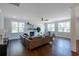 Spacious living room with hardwood floors, fireplace, and plenty of natural light at 383 Wappoo Trace Ln, Summerville, SC 29486