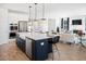 Open concept kitchen and living area with large island and modern finishes at 1661 Siloh Dr # 492, Mount Pleasant, SC 29466