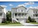 Two-story craftsman home with light gray siding, white trim, and a front porch at 1661 Siloh Dr # 492, Mount Pleasant, SC 29466