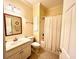 Bathroom with shower/tub combo, toilet, and vanity at 8541 Oyster Factory Rd, Edisto Island, SC 29438