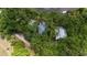 Aerial view showcasing the home's waterfront location and private setting at 8541 Oyster Factory Rd, Edisto Island, SC 29438