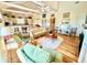 Spacious living room with high ceilings, hardwood floors, and ample natural light at 8541 Oyster Factory Rd, Edisto Island, SC 29438