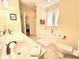Large bathroom with soaking tub, double vanity, and separate shower at 8541 Oyster Factory Rd, Edisto Island, SC 29438