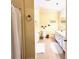 Clean bathroom with shower, toilet and double vanity at 8541 Oyster Factory Rd, Edisto Island, SC 29438