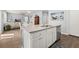 Kitchen island with granite countertop, sink, and dishwasher at 131 Cloverleaf St, Summerville, SC 29483