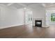 Living room with hardwood floors, fireplace and coffered ceiling at 1400 Dahlia Rd, Mount Pleasant, SC 29464