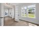 Sunlit office space featuring hardwood floors and French doors at 1400 Dahlia Rd, Mount Pleasant, SC 29464