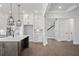 Open concept kitchen with white cabinets and island at 1400 Dahlia Rd, Mount Pleasant, SC 29464