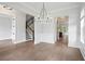 Elegant dining room with hardwood floors and chandelier at 1400 Dahlia Rd, Mount Pleasant, SC 29464