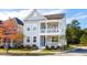 Two-story house with light gray siding, white trim, and a front porch at 130 Cantona Dr, Summerville, SC 29483