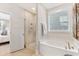 Spa-like bathroom with soaking tub, walk-in shower, and modern fixtures at 130 Cantona Dr, Summerville, SC 29483