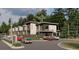 Modern two-story building with multiple garage units and ample parking at 3100 Fickling Hill Rd # 82, Johns Island, SC 29455